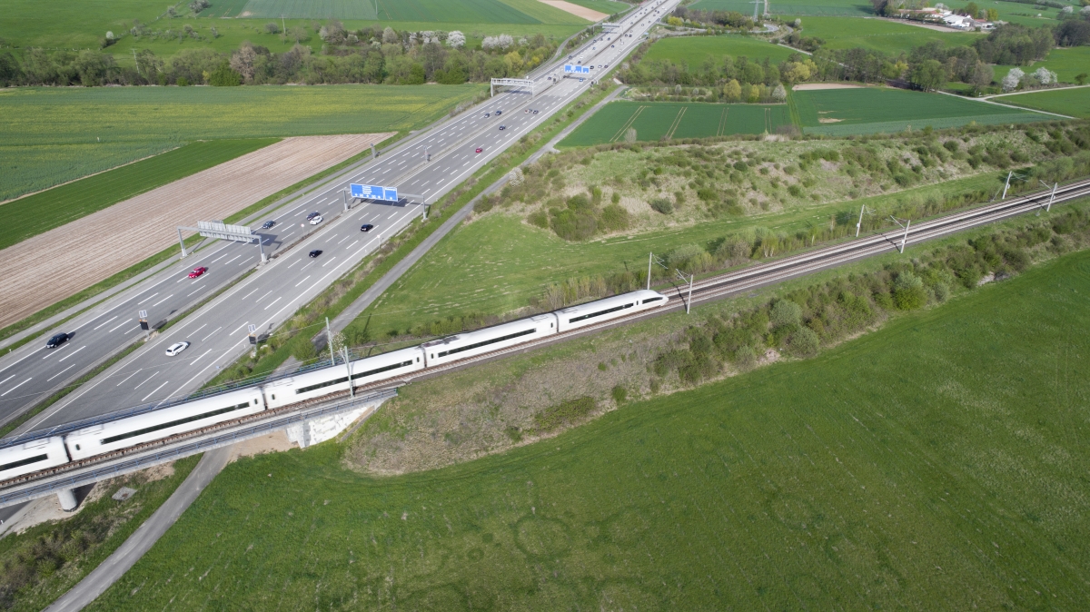 Railway bridge over highway - aerial view