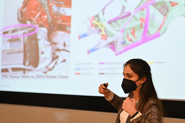 Maria Haider /AIT research group Complex Dynamical Systems explains where steel is installed in the vehicle. Photo credit: sprungbrett/ B. Gradwohl