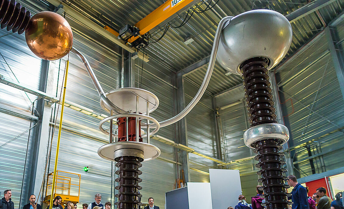 People listening to information in the high voltage and high current laboratory from Center for Energy