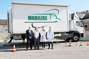 Mobilise Truck mit Team