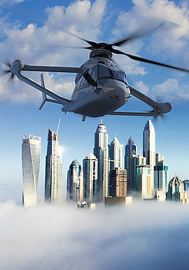 Simulation eines Hubschraubers vor Wolkenkratzern