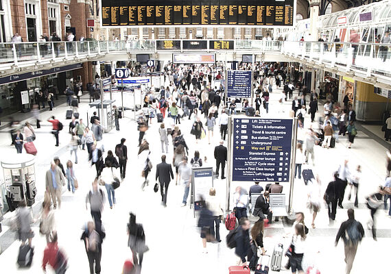 People in a railway hall