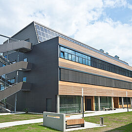 modern looking building with a lot of wood