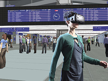 Frau mit VR-Brille in einem virtuellen Szenario am Bahnhof