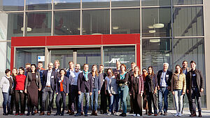 Group photo in front of AIT Austrian Institute of Technology building