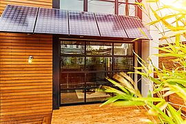 Modern Home with Solar Panel Awning