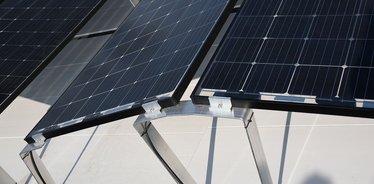 Photovoltaic panels attached to the roof