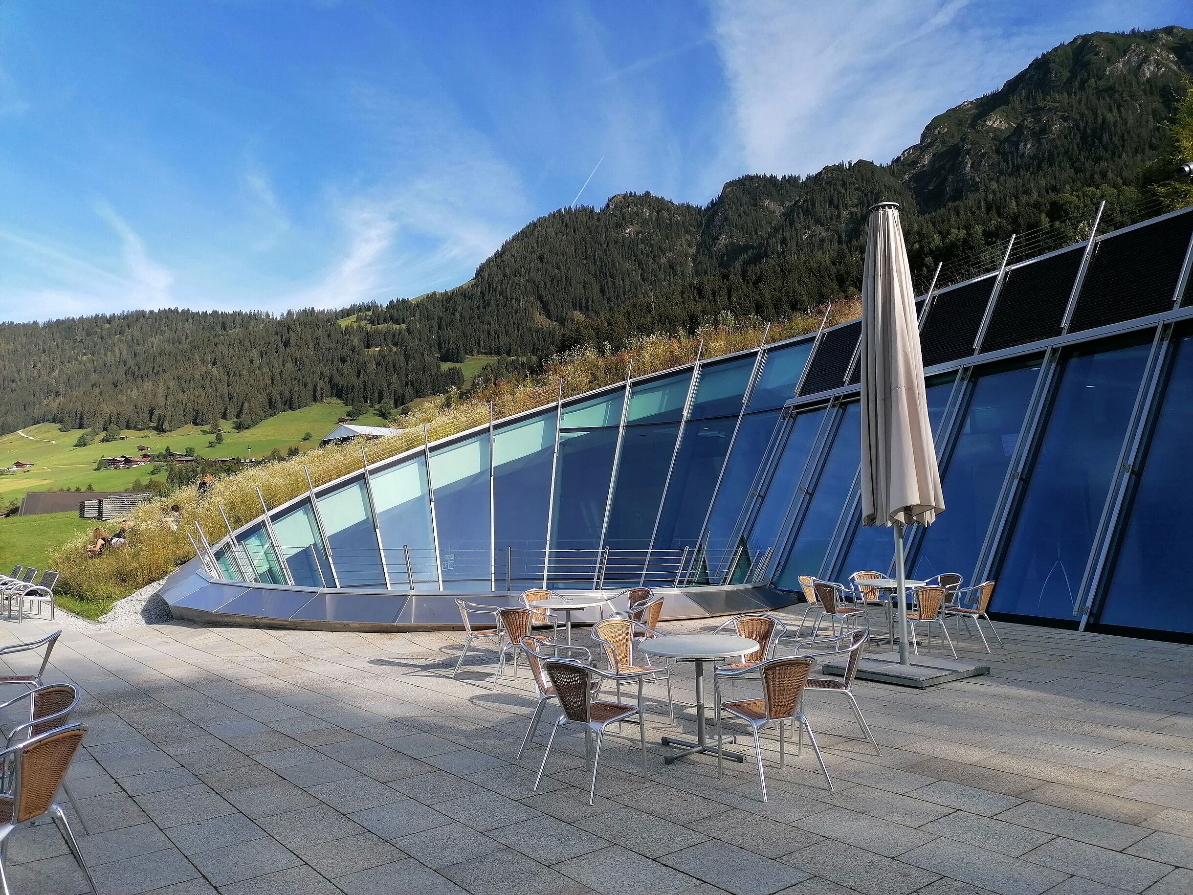 modern sitting area with mountains in background