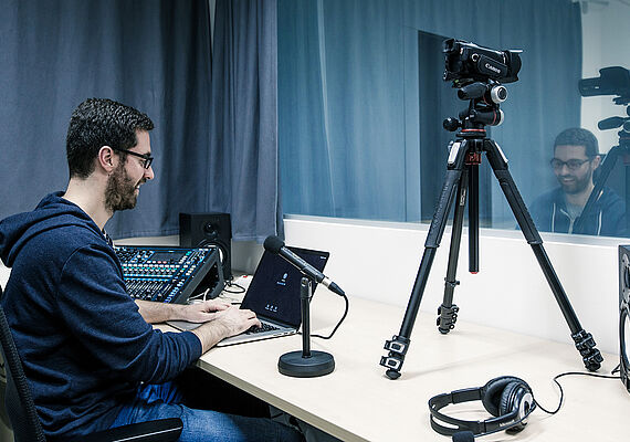 Person sitting in the control room