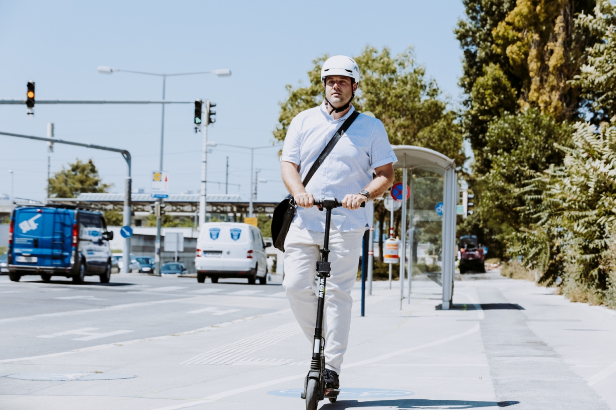 Man with E-Scooter