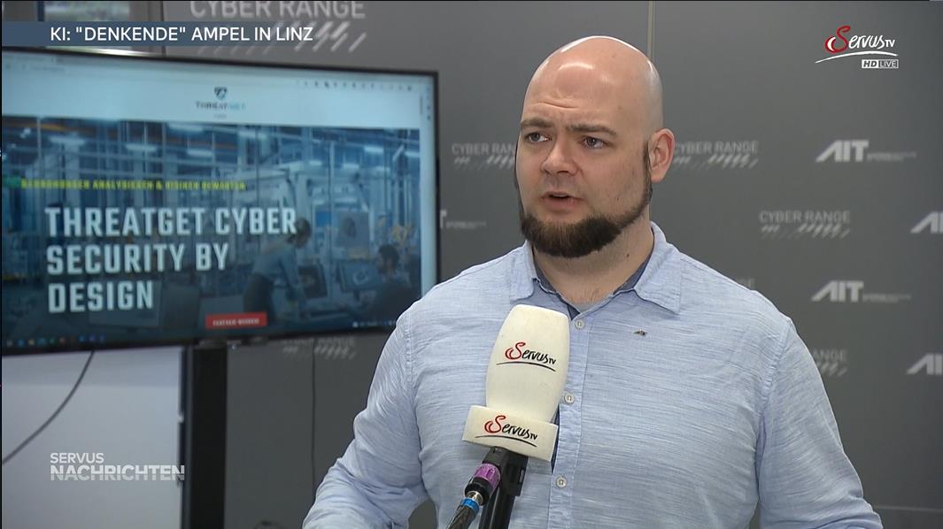 AIT expert Christoph Schmittner talks about AI in road traffic (Credit: ServusTV) 