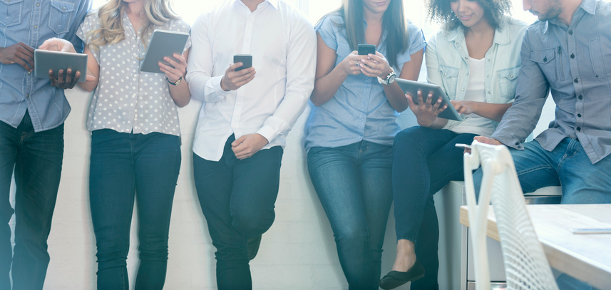 Group of people using mobile devices