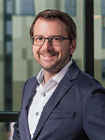Portraitfoto von Andreas Schuster