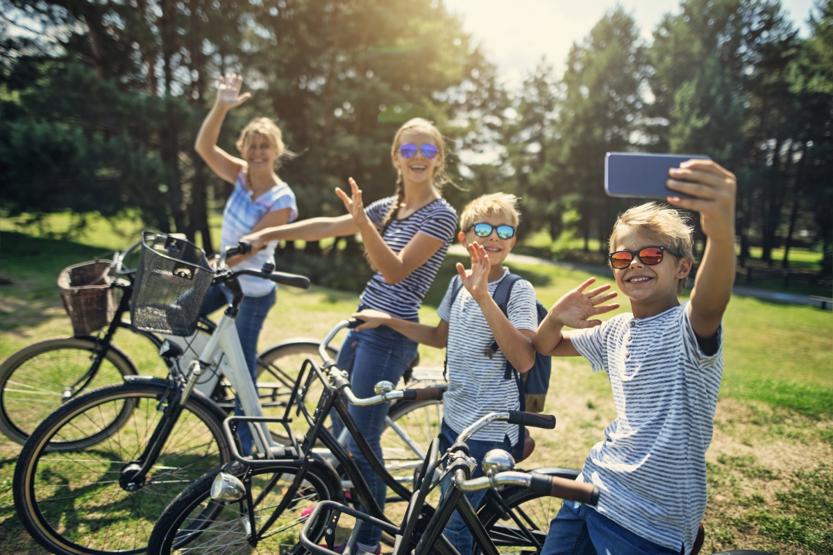 family taking a selfie on their bicycle trip